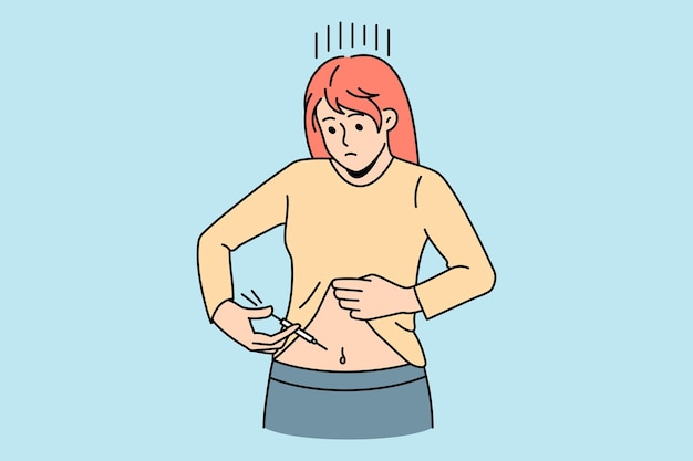Больная женщина делает инъекцию инсулина в живот
