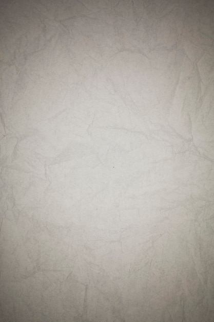 Zdjęcie zmięty papier biały tło.