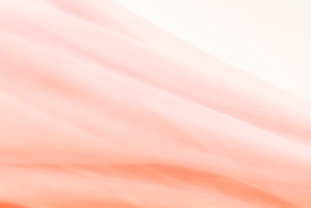 Textile texture background in coral pink for blog banner