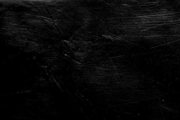 Фото Белые царапины с потертостями, изолированные на черном фоне