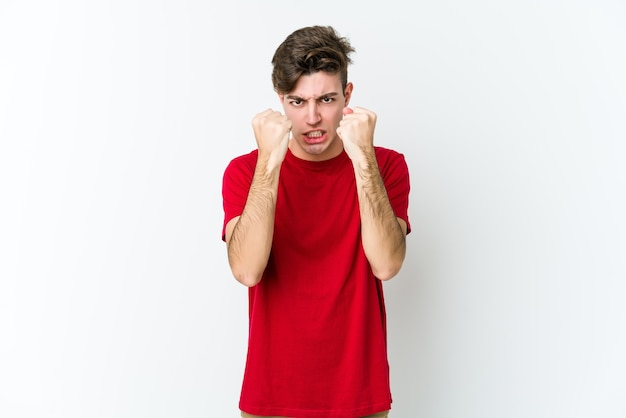 Photo young caucasian man showing fist, aggressive facial expression.