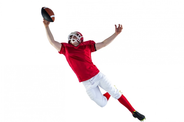 Photo american football player scoring a touchdown