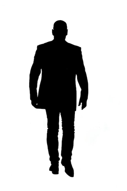 Photo back view of a silhouette of a bald man walking dressed in a jacket