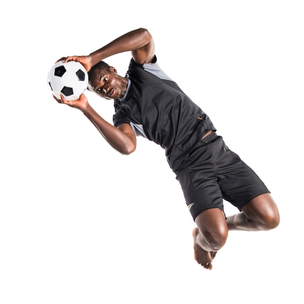 Фото Черный человек играет в футбол