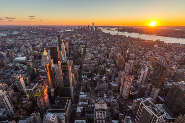 Cityscape of Manhattan, New York at Sunset. United States of America. Aerial View. Wide Shot