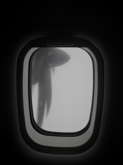 Photo close-up of airplane window