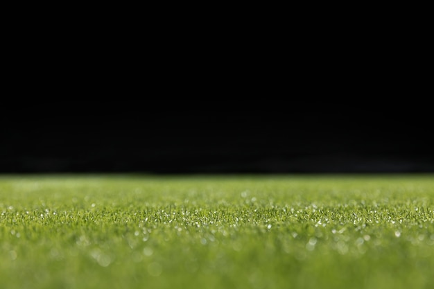 Крупный план зеленого футбольного поля