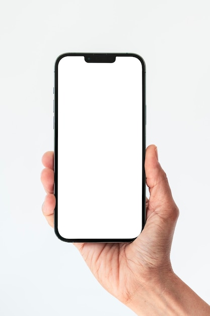 Крупным планом рука держать телефон изолированы на белом смартфоне белый цвет пустой экран