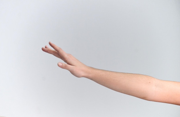 Foto close-up della mano su sfondo bianco