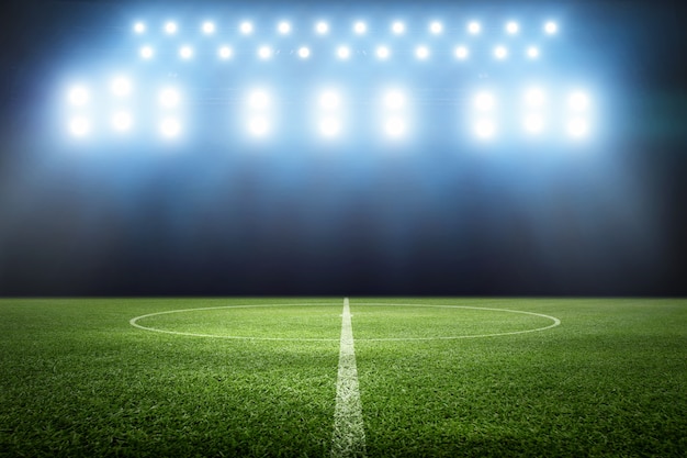 Photo football stadium, shiny lights, view from field. soccer concept