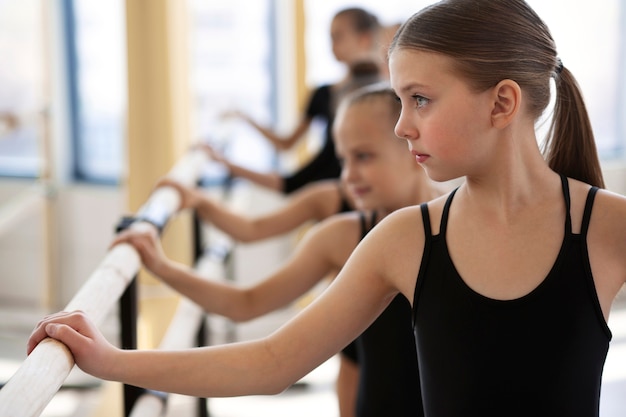 Girls practicing and exercising during ballet classes