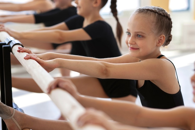 Girls practicing and exercising during ballet classes