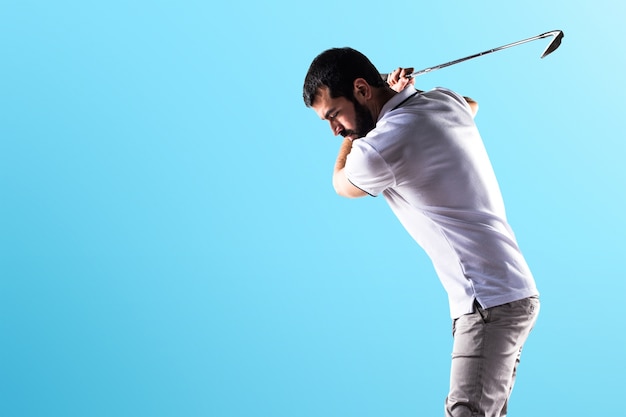 Photo golfer man on colorful background