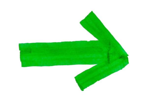 Foto groene pijl geïsoleerd op een witte achtergrond pijlteken getekend met een groene markerpen