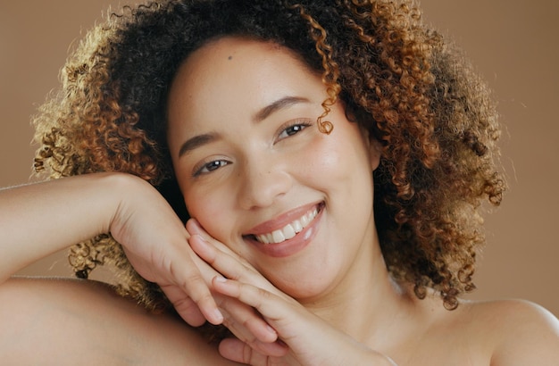 Photo happy woman portrait and face in natural beauty skincare cosmetics or makeup against a studio background female person or model smile in dermatology soft skin or facial spa treatment and grooming