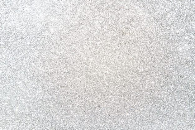 High angle view of shiny silver colored glitter background