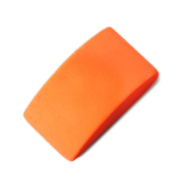 Фото Оранжевый ластик на белом фоне