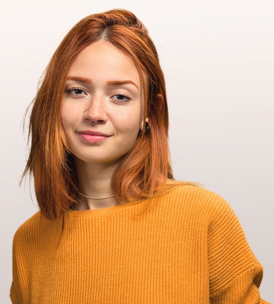 Photo portrait of a pretty redhead girl happy