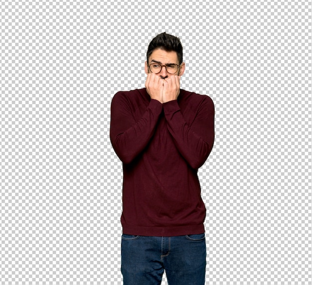 PSD handsome man with glasses is a little bit nervous and scared putting hands to mouth