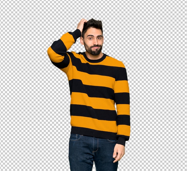 PSD handsome man with striped sweater with an expression of frustration and not understanding