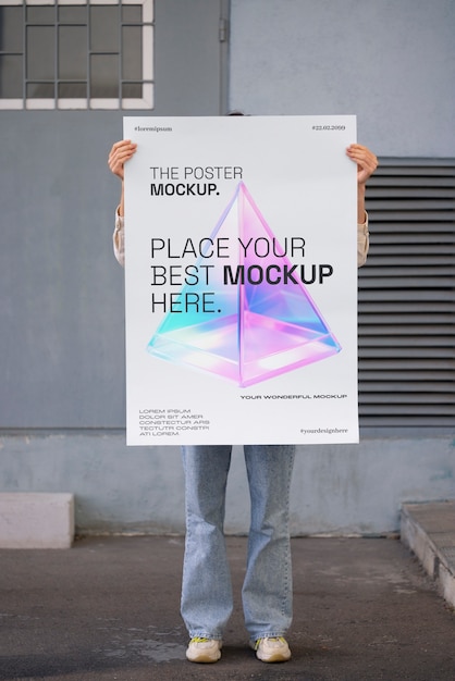 Person holding poster mockup