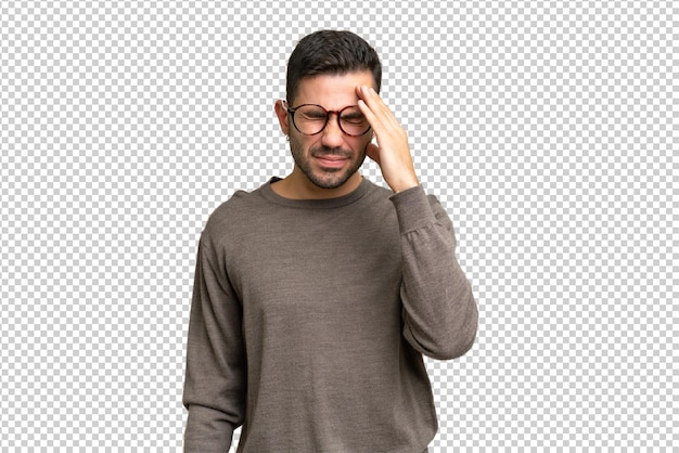 PSD young handsome caucasian man over isolated background with headache