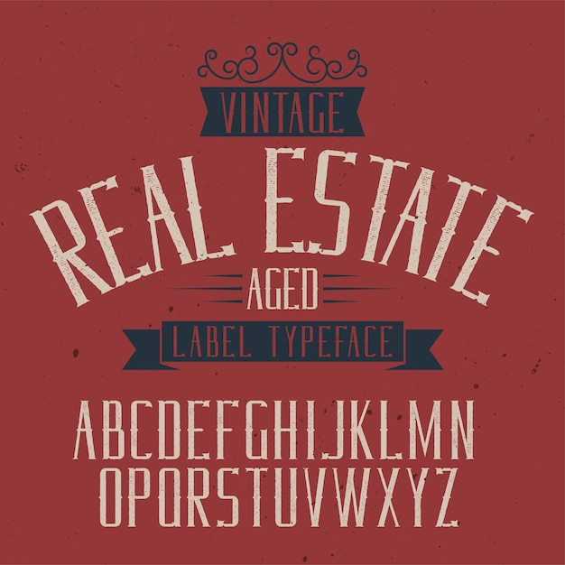 Vecteur gratuit police d'étiquette vintage nommée real estate.
