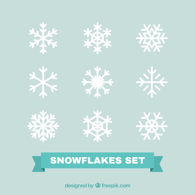 Packung mit weißen dekorativen Schneeflocken in flaches Design