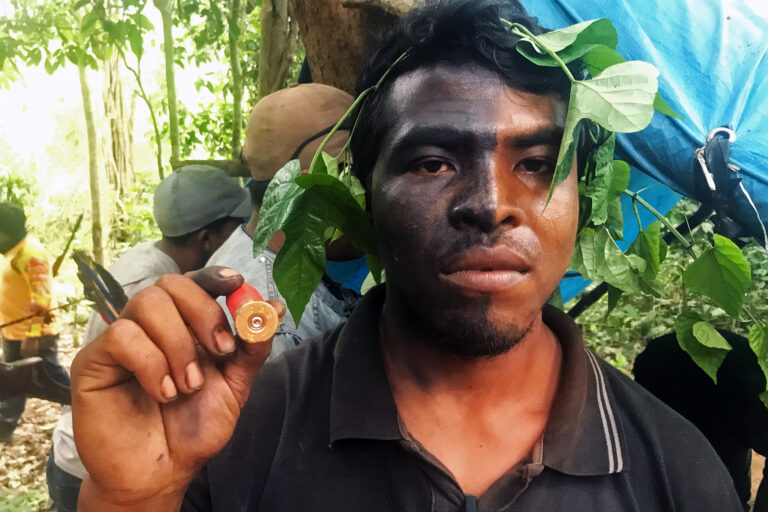 Indigenous leader Paulo Paulino Guajajara shows a bullet shell in 2019.
