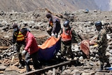 Nepalese resident helps rescue personnel retrieve body