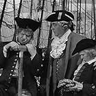 Wallace Beery, Nigel Bruce, and Jackie Cooper in Treasure Island (1934)