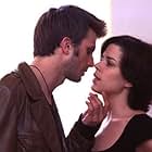 Neve Campbell and Frederick Weller in When Will I Be Loved (2004)