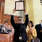Ray Charles (JAMIE FOXX) is honored by the State of Georgia (with KERRY WASHINGTON as Della Bea Robinson by his side) as "Georgia on My Mind" is declared the official state song in the musical  biographical drama, Ray.