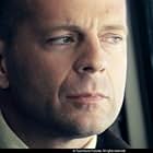 Bruce Willis, starring as David Dunn, on the train that will change his life - Photo Credit: Frank Masi. S.M.P.S.P.