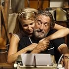 Robert De Niro and Dianna Agron in The Family (2013)