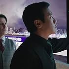 Noah Taylor and Chin Han in Skyscraper (2018)