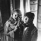Sophie Ward and Alan Cox in Young Sherlock Holmes (1985)