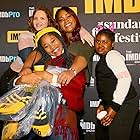 Jordana Spiro, Dominique Fishback, Angelica Nwandu, and Tatum Marilyn Hall in Night Comes On (2018)