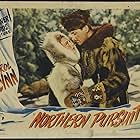 Errol Flynn and Julie Bishop in Northern Pursuit (1943)