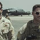 Bradley Cooper and Sam Jaeger in American Sniper (2014)