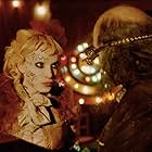 Emilie Autumn as Painted Doll in a still from The Devil's Carnival directed by Darren Lynn Bousman. With Dayton Callie.