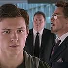 Robert Downey Jr., Jon Favreau, and Tom Holland in Spider-Man: Homecoming (2017)