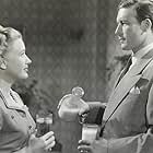 Priscilla Lane and Lawrence Tierney in Bodyguard (1948)