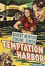 Robert Newton and Simone Simon in Temptation Harbour (1947)
