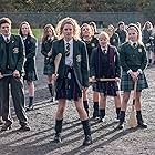 Nicola Coughlan, Dylan Llewellyn, Louisa Harland, Jamie-Lee O'Donnell, Beccy Henderson, and Saoirse-Monica Jackson in Derry Girls (2018)