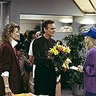 Candice Bergen, Morgan Fairchild, and Joe Regalbuto in Murphy Brown (1988)