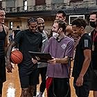 Vecsey showing the NBA players some footage