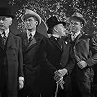 Errol Flynn, Jack Carson, and Wallis Clark in Gentleman Jim (1942)