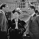 Errol Flynn, John Loder, and Alexis Smith in Gentleman Jim (1942)