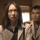 Makoto Ashikawa and Yûko Daike in Ju-on (2000)
